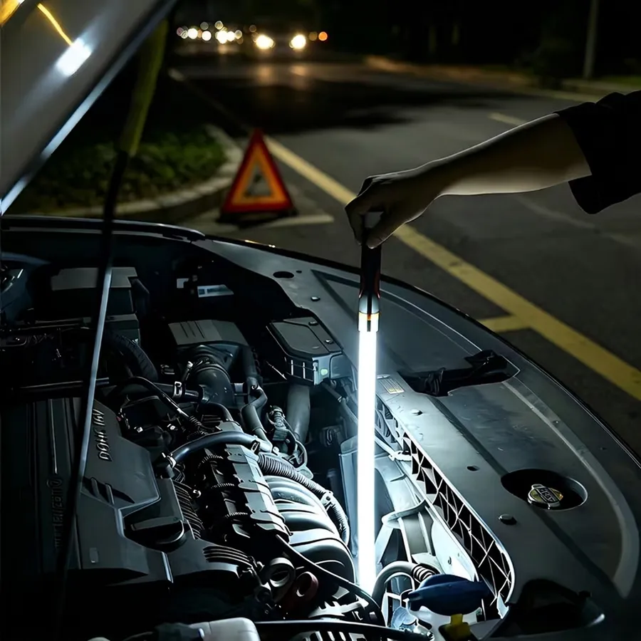 Nagslang Flex lighting an engine bay on a dark roadside