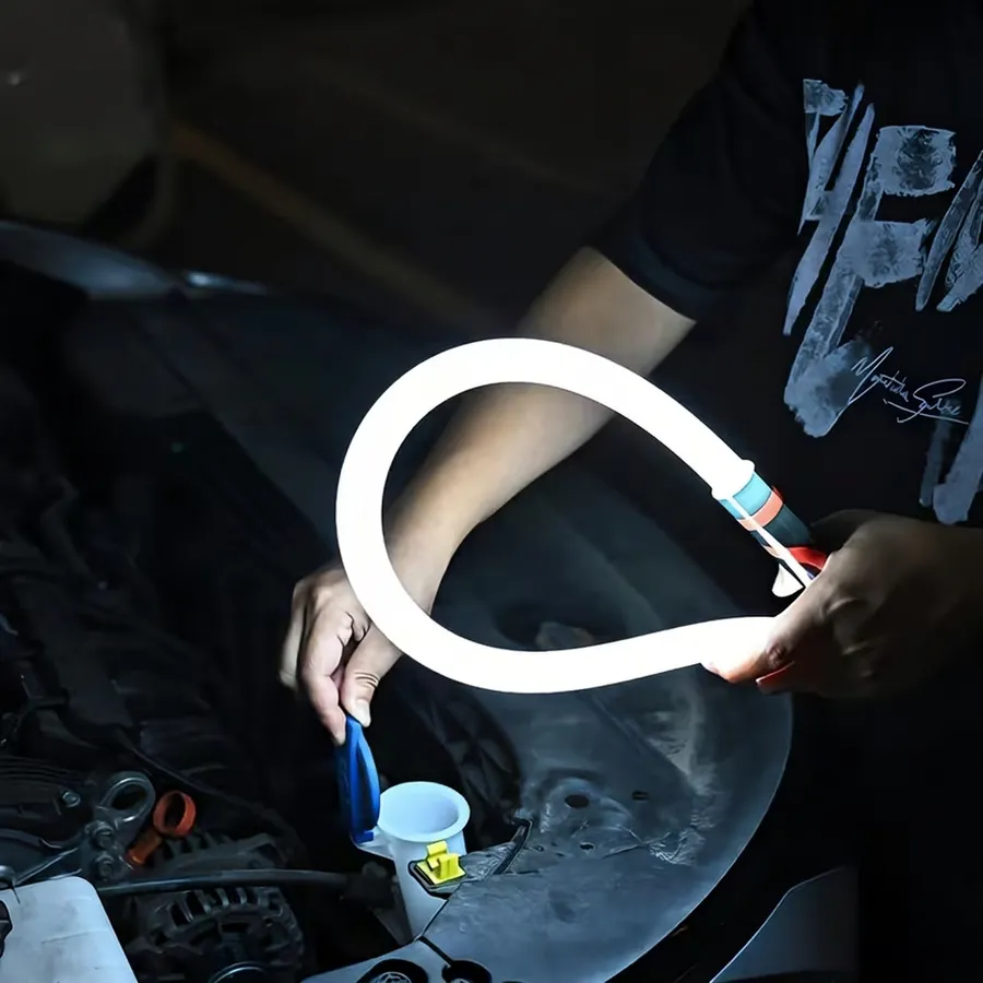 Hands bending the Nagslang Flex over an engine bay